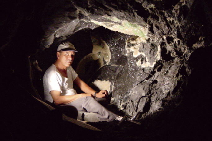 Fasi Makki collecting apophyllites in the pocket in 2001. S. Makki photo.