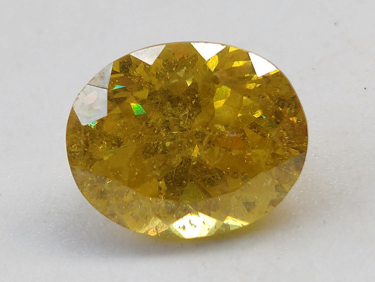 黄绿色闪锌矿圆型宝石刻面切面戒指面祼石强火彩七彩色光3.7克拉,闪锌矿